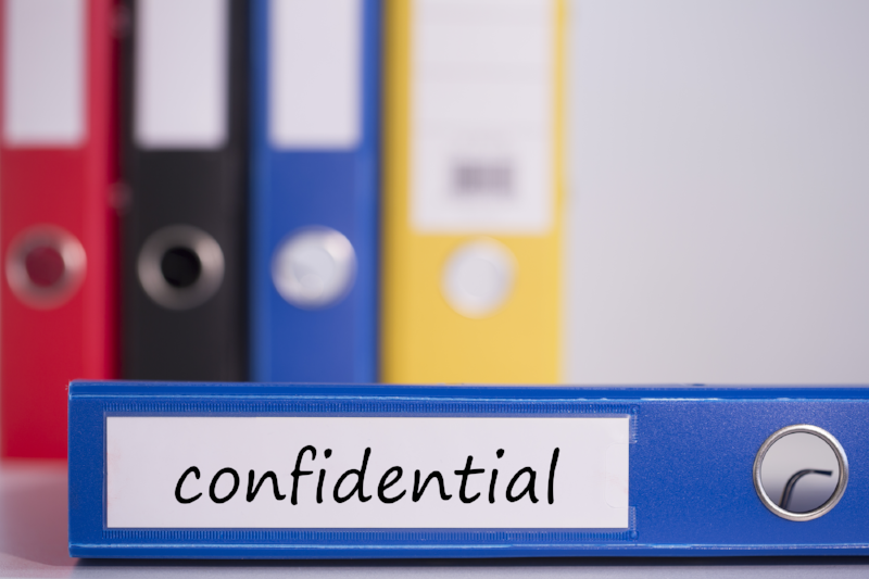 stock-photo-the-word-confidential-on-blu-1088564-366212-edited.png