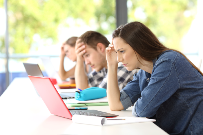 stock-photo-worried-students-doing-diffi-2446088-696926-edited.png