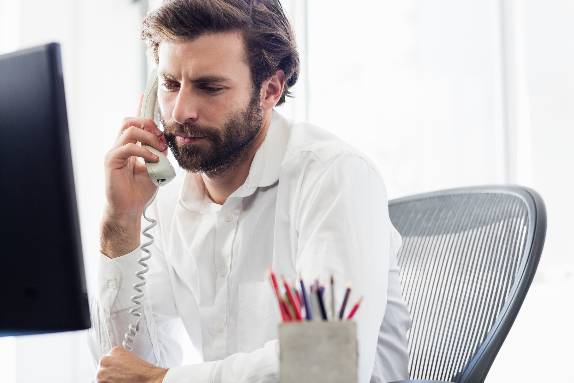 stock-photo-a-man-having-a-phone-call-in-1845087