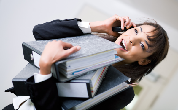 stock-photo-an-office-woman-handling-sim-635734-823798-edited.png