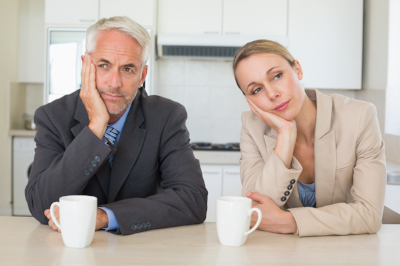 stock-photo-bored-business-couple-having-1086457-982270-edited.png