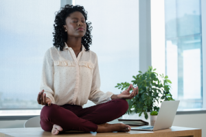 stock-photo-female-executive-meditating--2368253-207007-edited.png