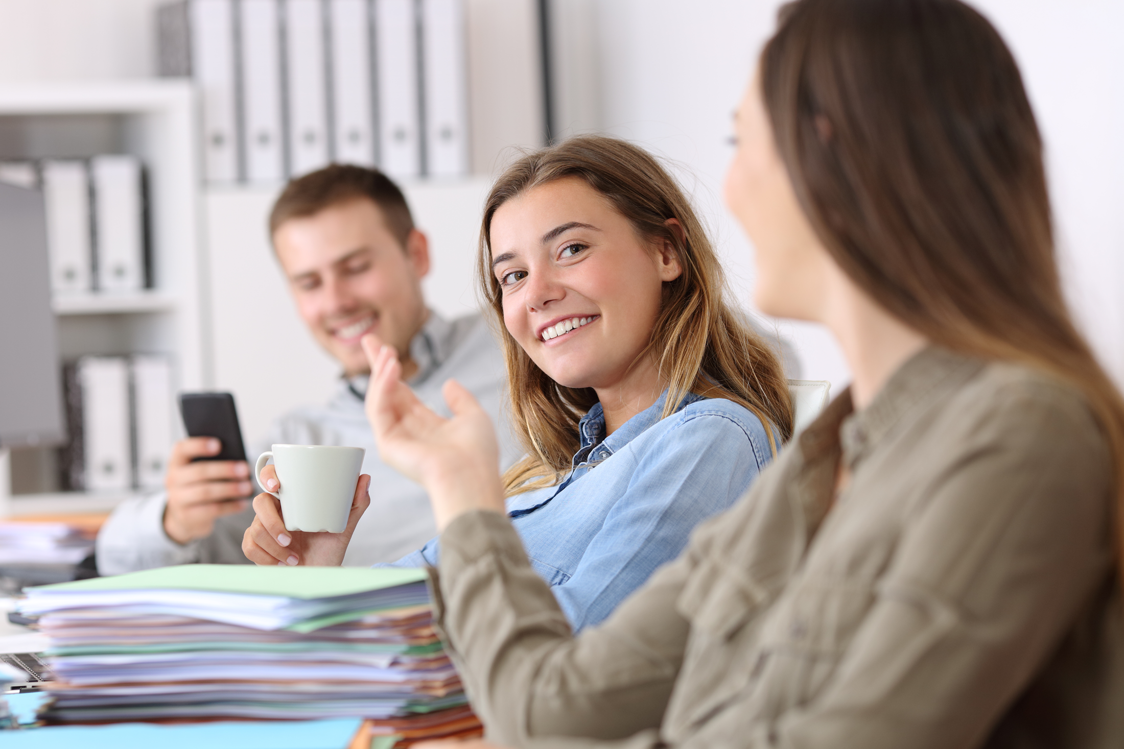 stock-photo-lazy-employees-talking-and-w-2440567