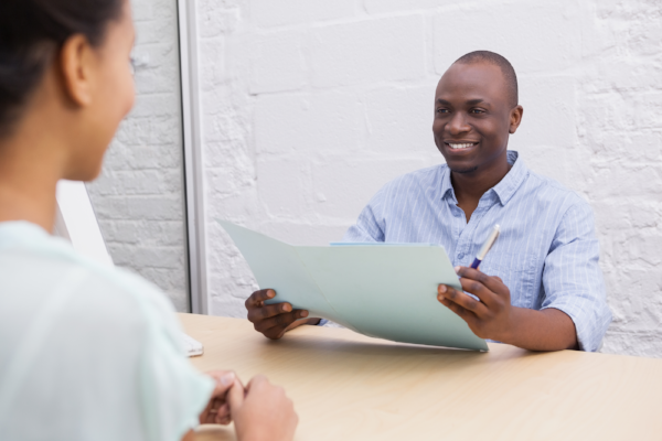 stock-photo-smiling-businessman-holding--997193-894334-edited